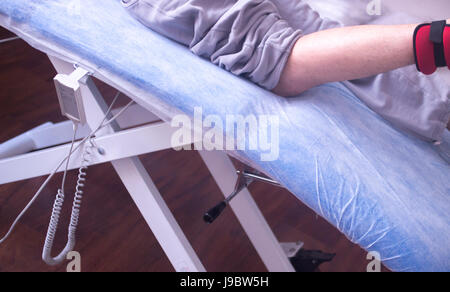 Physical therapy mecical clinic physiotherapy treatment for knee injury and rehabilitation after surgery. Stock Photo