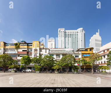 HO CHI MINH CITY, VIETNAM - APRIL 9, 2017: Various buildings lines the Nguyen Hue avenue in the heart of Ho Chi Minh City, the largest city in Vietnam Stock Photo