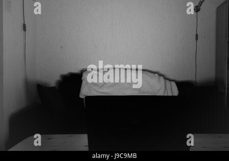 Computer screen illuminating a dark room at night Stock Photo - Alamy