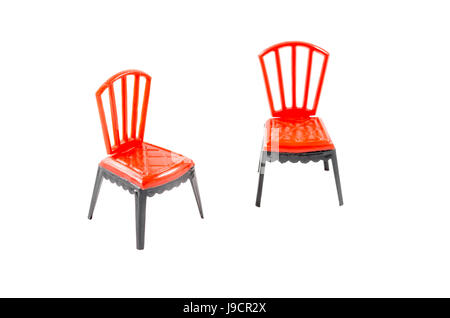 Red plastic chair isolated on white background Stock Photo