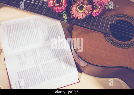 Play guitar and composed songs using Stock Photo