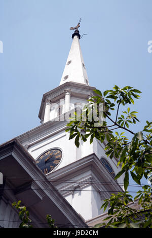 The clock and steeple of St Andrew's Church in the centre of Benoy-Badal-Dinesh Bagh Kolkata Calcutta West Bengal Indai Stock Photo