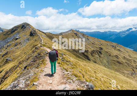 Female hiker on Kepler Track, Fiordland National Park, Southland, New Zealand Stock Photo