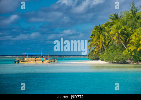 Traditional wood carved boat in the Aitutaki lagoon, Rarotonga and the Cook Islands, South Pacific, Pacific Stock Photo