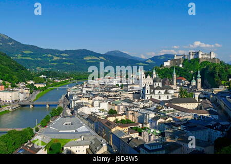 View from Moenchsberg Hill across Salzach River with Cathedral, Collegiate Church and Fortress Hohensalzburg, Salzburg, Austria Stock Photo