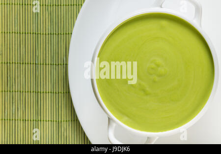cream soup puree of green peas view from the top Stock Photo