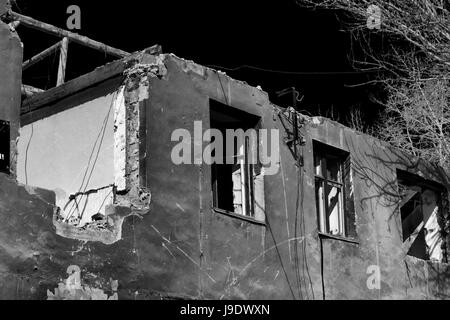 Destroyed Building. The beginning of a new day. Black and White Stock Photo