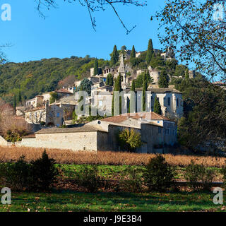 La Roque-sur-Ceze, it is very picturesque village on a rocky peak in southern France. This place classified as one of the most beautiful villages in F Stock Photo