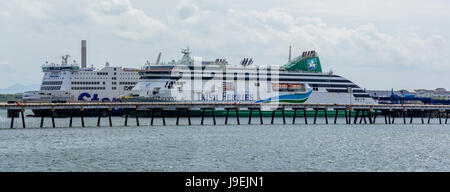 Ferries awaiting departure at the docks in Holyhead on Anglesey Stock Photo