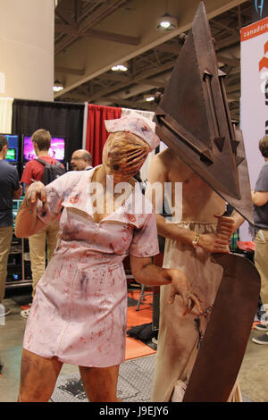 A couple cosplays characters from Horror videogame franchise Silent Hill,  Stock Photo, Picture And Rights Managed Image. Pic.  UIG-1059-48-CHP-SOFA2021-D3-20211016016