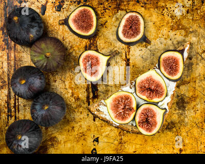 Fresh Figs and Cream Cheese on Wholegrain Toast On An Oven Tray Stock Photo