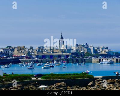 Roscoff, old port and town, with boats floating in the harbor. Finistère, Brittany, France Stock Photo