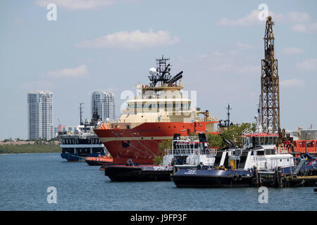 Tugs and offshore supply ships alongside in the Port of Tampa Florida USA. April 2017 Stock Photo