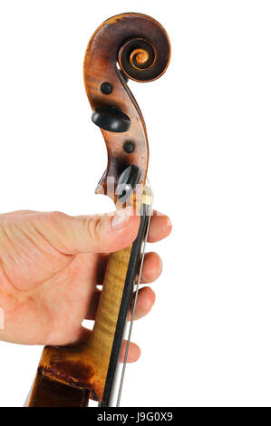 Image violin lies in a human hand.String instrument isolated on white background.Fingers play music Stock Photo