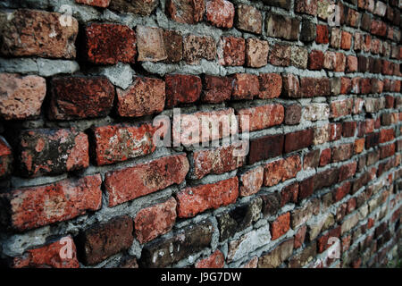 Old brick wall close-up in perspective Stock Photo