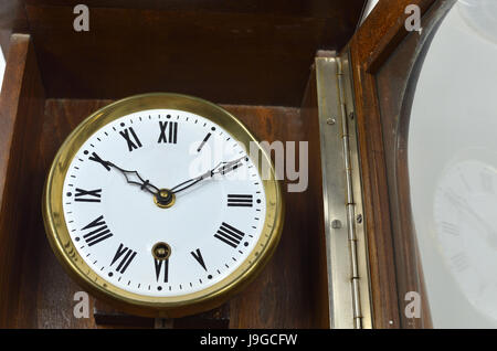 Wall clock in vintage style showing ten passed ten Stock Photo