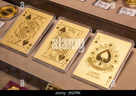 China, Macau, Gold and Jewellery Shop Window, Display of Gold Playing Cards Stock Photo