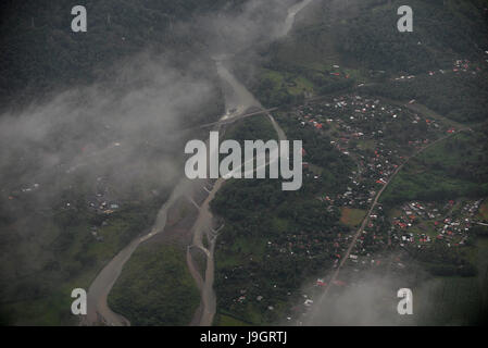 An aerial view of a river winding through small agricultural towns in Costa Rica. Stock Photo