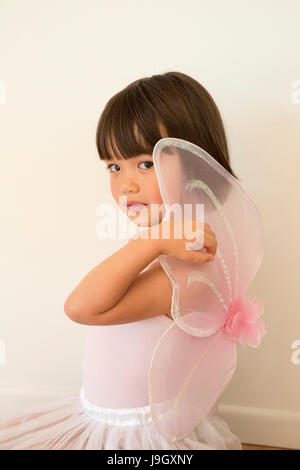 Four year old girl dressed up as a fairy princess Stock Photo