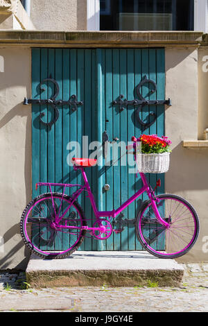 white bike basket with flowers