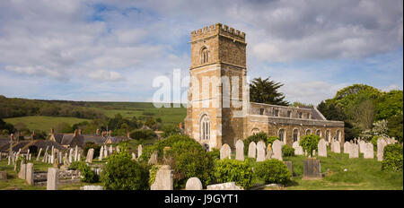 UK England, Dorset, Abbotsbury, Church Street, St Nicholas parish church and churchyard, panoramic Stock Photo