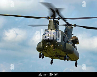 Culdrose, UK. 1st Jun, 2017. Final Flight – but with a hot future. Two retired aircraft made their final flights from RNAS Culdrose today with the helping hand of a Chinook helicopter. The old Royal Navy aircraft were moved across the Lizard Peninsula as ‘under-slung loads’ by a heavy lift RAF helicopter, and taken to their final resting place at Predannack airfield.  Credit: Bob Sharples/Alamy Live News Stock Photo