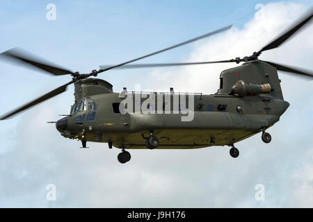 Culdrose, UK. 1st Jun, 2017. Final Flight – but with a hot future. Two retired aircraft made their final flights from RNAS Culdrose today with the helping hand of a Chinook helicopter. The old Royal Navy aircraft were moved across the Lizard Peninsula as ‘under-slung loads’ by a heavy lift RAF helicopter, and taken to their final resting place at Predannack airfield.  Credit: Bob Sharples/Alamy Live News Stock Photo