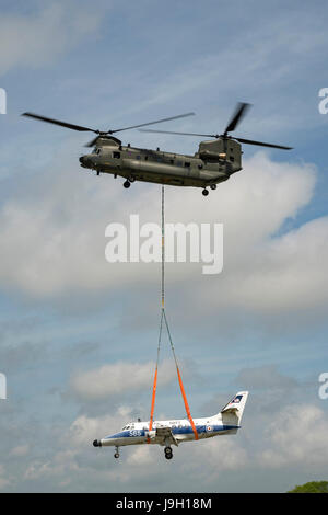 Culdrose, UK. 1st Jun, 2017. Final Flight – but with a hot future. Two retired aircraft made their final flights from RNAS Culdrose today with the helping hand of a Chinook helicopter. The old Royal Navy aircraft were moved across the Lizard Peninsula as ‘under-slung loads’ by a heavy lift RAF helicopter, and taken to their final resting place at Predannack airfield.  Credit: Bob Sharples/Alamy Live News Stock Photo