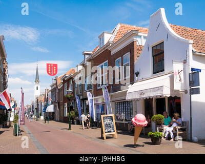 Street scene of Voorstraat with Saint Jacob's Church in old town of Brielle, Voorne-Putten, South Holland, Netherlands Stock Photo
