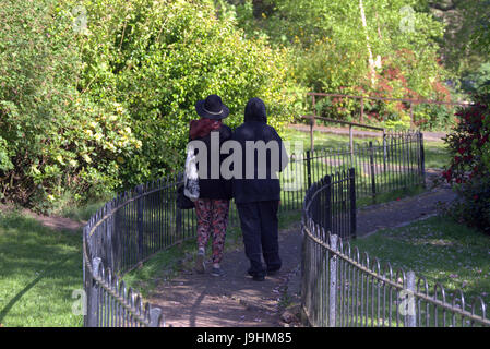 Glasgow Kelvingrove park scenes couples holding hands Stock Photo