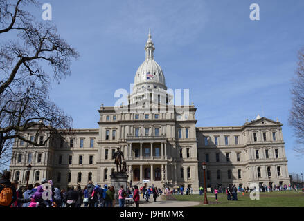 LANSING, MI - MARCH 27:  The Michigan State Capitol, hosted a visit by the Easter Bunny on March 27, 2016. Stock Photo