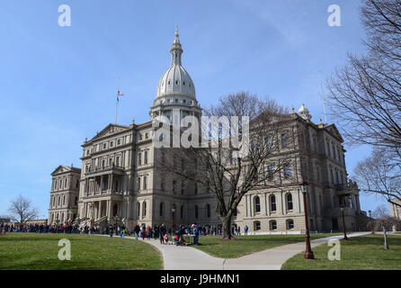 LANSING, MI - MARCH 27:  The Michigan State Capitol, hosted a visit by the Easter Bunny on March 27, 2016. Stock Photo