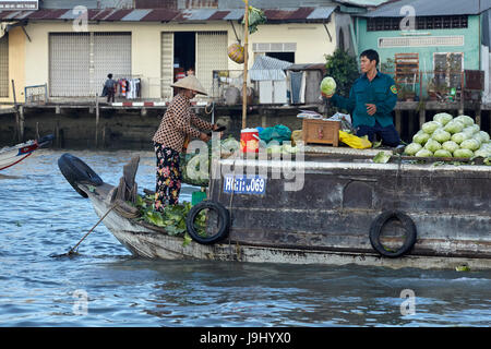 Boat selling wholesale produce, Cai Rang floating market, Can Tho, Mekong Delta, Vietnam Stock Photo