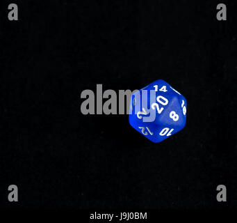 Blue d20 critical success roll RPG polyhedral game dice Stock Photo