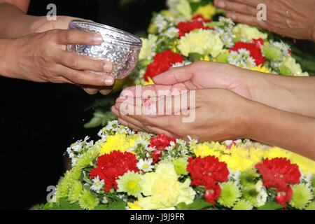 songkran festival is new year in Thailand, water blessing ceremony of adults Stock Photo