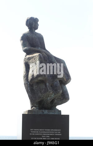 Memorial located in Urk, Netherlands, a tribute to all the men who perished at sea. The plaques on the wall lists the men in the year they were lost. Stock Photo