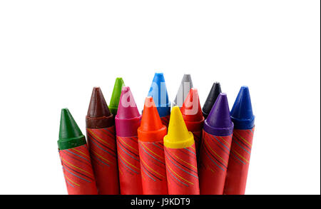 Crayons lined up in rainbow isolated on white background. Stock Photo