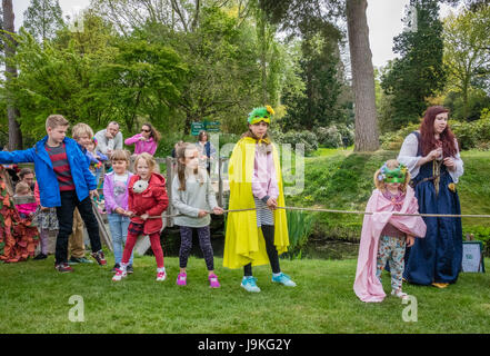 Hever Castle, England -  April 2017 : Children preparing for the tug of war rope pulling at the May Day festival at the Hever Castle, Kent, England, U Stock Photo