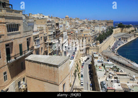 Historic buildings on the Grand Harbour waterfront in Valletta, Malta Stock Photo