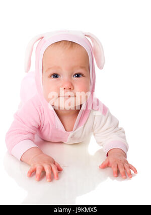 six month baby wearing bunny suit isolated on white Stock Photo