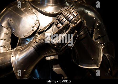 Suit of armour and gloves detail in the Tower of London, UK Stock Photo