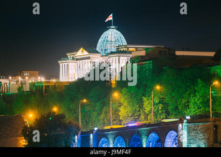 Tbilisi, Georgia. Presidential Administration Palace, Avlabari Residence In Night Illumination, Uptown Of Avlabari District. Famous Landmark Stock Photo