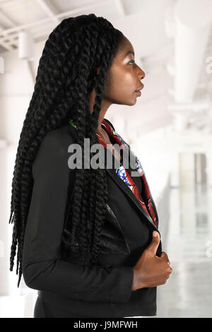 Profile of African American businesswoman inside office building Stock Photo