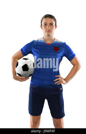 Portrait of female soccer player holding ball isolated over white background Stock Photo
