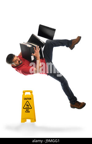 Businessman falling on Wet Floor isolated over white background Stock Photo