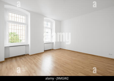 empty room, wooden floor in new apartment Stock Photo