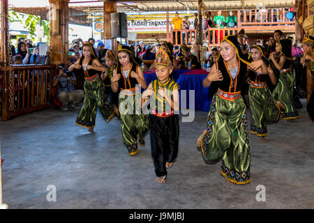 Gathering of indigenous kadazandusan groups on last day of Pesta Kaamatan or harvest festival at Hogkod Koisaan KDCA in Kota Kinabalu Sabah Malaysia Stock Photo