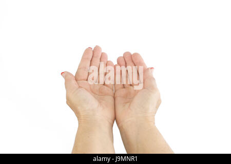 Female hands open palm gesture isolated on white background. Two empty hands woman. Cupped hands. Concept of giving, holding and showing. Stock Photo