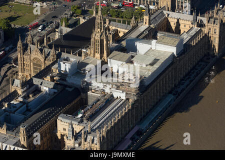 Aerial view of The Palace of Westminster currently covered in scaffolding undergoing repairs. Commonly known as the Houses of Parliament, London, UK Stock Photo