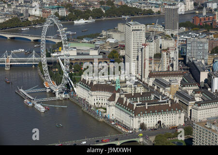 The London Eye sits on the South Bank of the River Thames. The Jubilee Gardens and County Hall Building. Lambeth, London Stock Photo